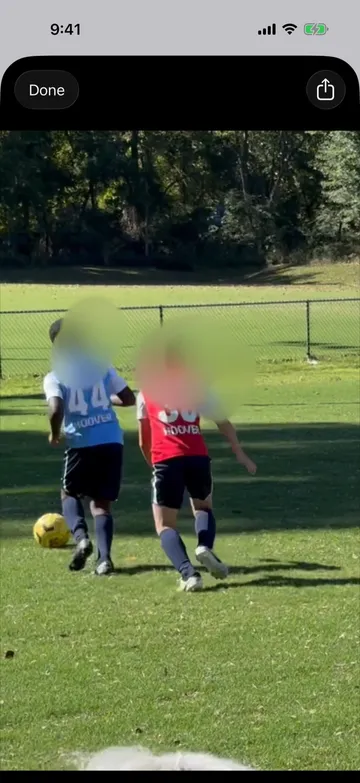 A vertical highlight clip playing in KudosReel, cropped to follow the player